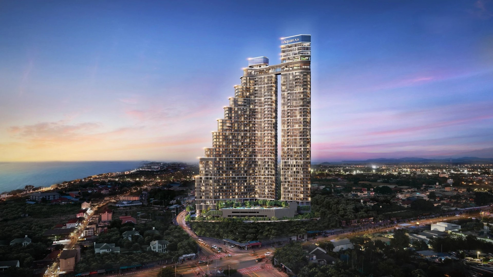 Aquarous Jomtien Pattaya — вид на обе башни на закате